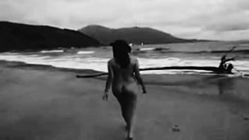 Naked woman posing on the beach for the cuckold to shoot