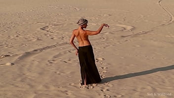 Sofi. Naked dancing in the sand